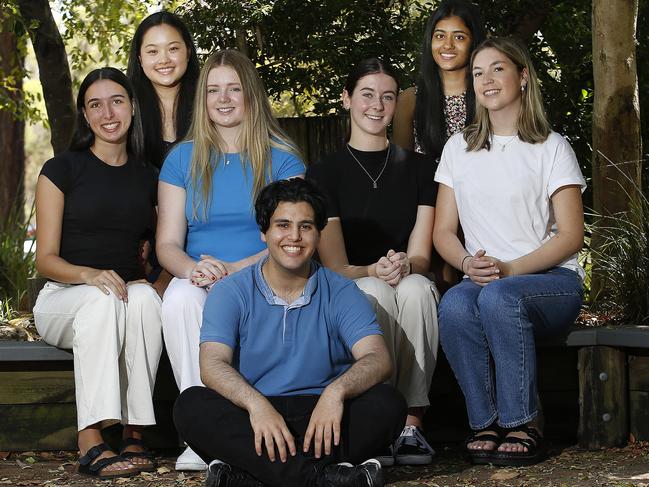 L to R: St Paul’s Grammar IB students Emily Cooper, 18, Angelina He, 17, Charlotte Murray, 17, Mazin Alfadhli, 18, Abigail Keane, 18, Dishitha Dasireddy, 17 and Jasmine Digges, 18 were all delighted to finally receive their marks on Tuesday. Picture: John Appleyard