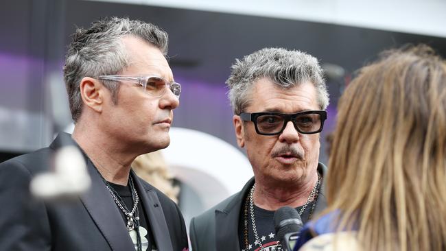 INXS members Andrew and Tim Farriss on the red carpet at the 28th ARIA Awards in 2014. Picture: AAP Image