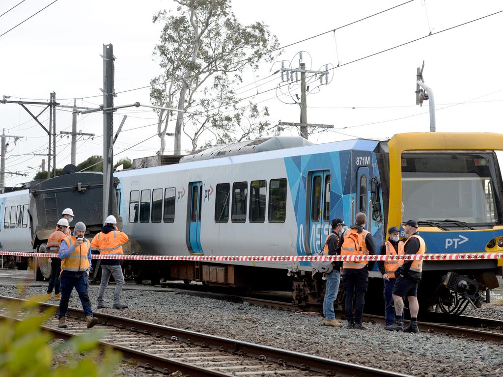 Glen Waverley station Two in hospital after truck, train collide in