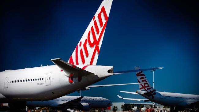 Virgin Australia is already trimming its network after being sold to Bain Capital. Picture: Patrick Hamilton/AFP