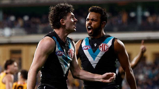 ADELAIDE, AUSTRALIA - SEPTEMBER 13: Willie Rioli (right) and Darcy Byrne-Jones of the Power celebrate during the 2024 AFL Second Semi Final match between the Port Adelaide Power and the Hawthorn Hawks at Adelaide Oval on September 13, 2024 in Adelaide, Australia. (Photo by Michael Willson/AFL Photos via Getty Images)