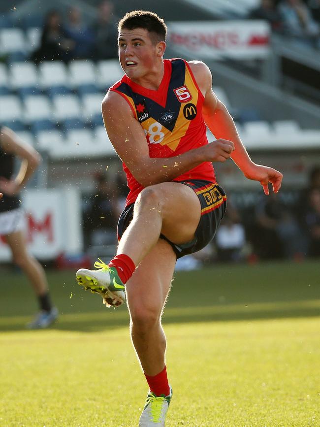 Hourigan gets a kick away during the under-18 national championships in 2013.