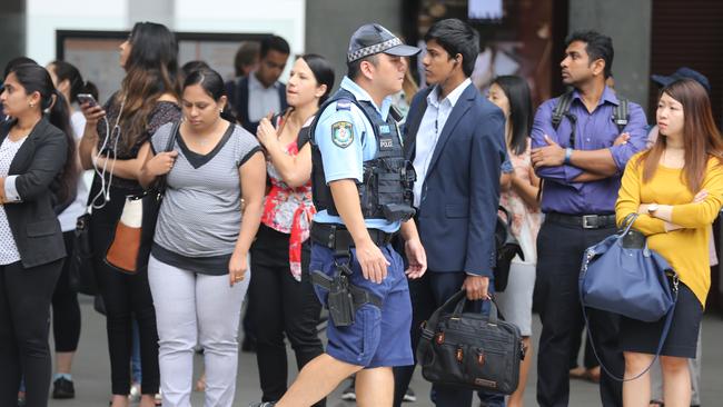 Police helped control crowds at Parramatta station. Picture: John Grainger