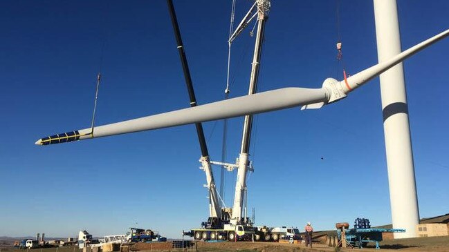 The German-designed Liebherr all-terrain crane at work lifting a wind turbine rotor. Picture: Supplied.