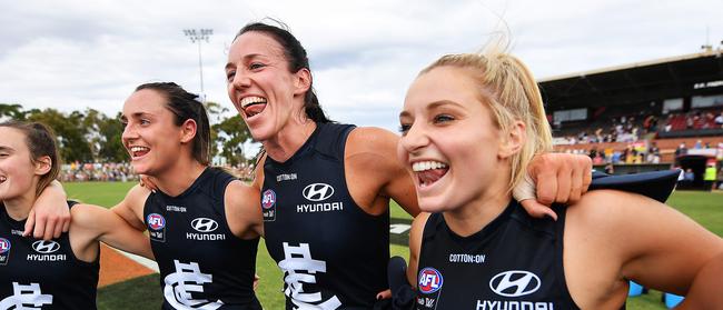 Carlton players sing the club song after beating Adelaide at Richmond Oval in the grand final rematch on Sunday. Picture: Mark Brake/Getty Images