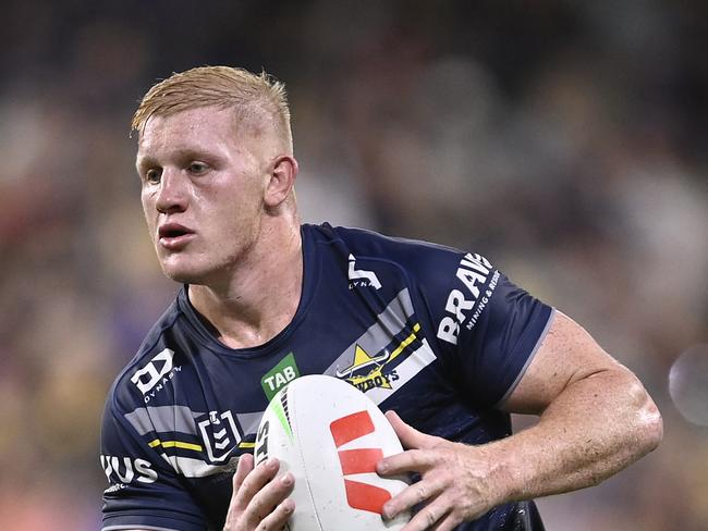 TOWNSVILLE, AUSTRALIA - APRIL 07: Griffin Neame of the Cowboys runs the ball during the round six NRL match between North Queensland Cowboys and Dolphins at Qld Country Bank Stadium on April 07, 2023 in Townsville, Australia. (Photo by Ian Hitchcock/Getty Images)
