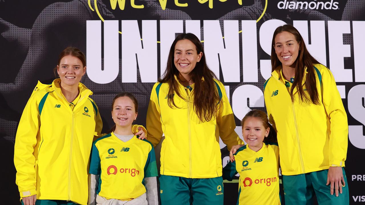 Steph Wood, Ruby Bakewell-Doran and Cara Koenen pose for a photo with fans during the Australian Diamonds World Cup farewell event