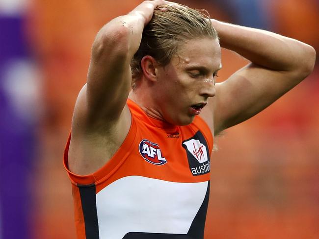 SYDNEY, NEW SOUTH WALES - MAY 12: Lachie Whitfield of the Giants looks dejected during the round eight AFL match between the Greater Western Giants and the West Coast Eagles at Spotless Stadium on May 12, 2018 in Sydney, Australia.  (Photo by Mark Kolbe/Getty Images)