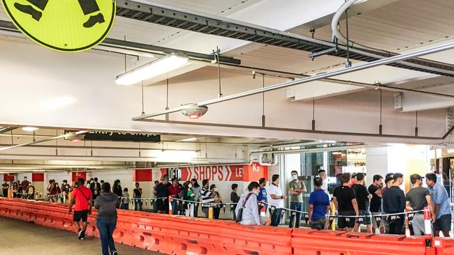 Boxing Day shoppers as they attend the sales at DFO Homebush. They seem to have forgotten about social distancing and covid worries. Pic: Flavio Brancaleone