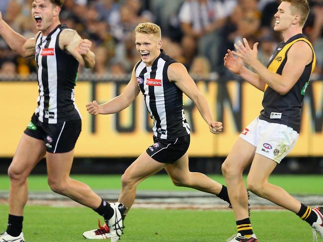 Adam Treloar celebrates the win on the final siren. Picture: Getty