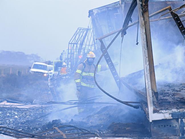 The trucks burst into flames when the collision occurred. Picture: Tom Huntley