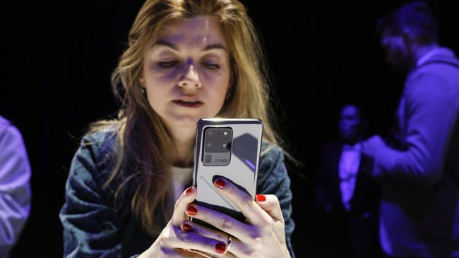 A woman inspects the Samsung Galaxy S20 Ultra in San Francisco. Picture: Kim White/Getty Images/AFP