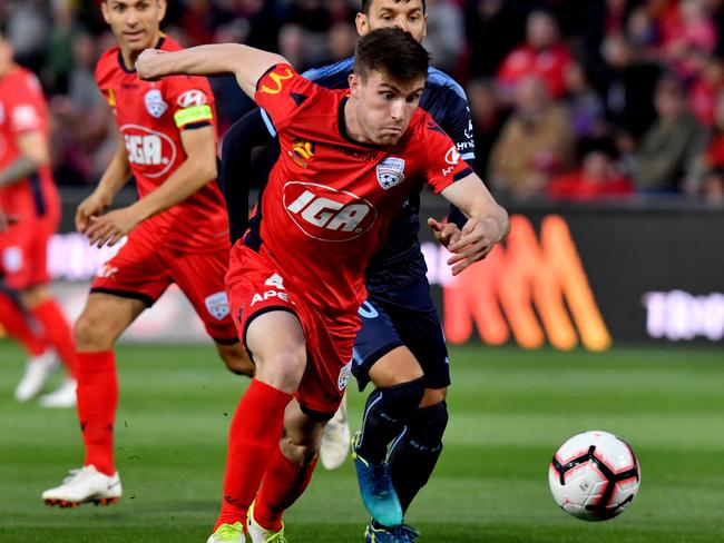 Adelaide United’s Ryan Strain in action against Sydney FC. Picture: AAP