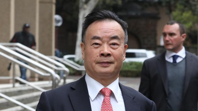 Chau Chak Wing leaves the Federal Court, in 2018.