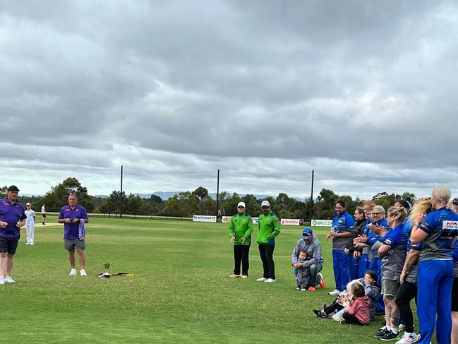 MPCA general manager Jason Nagel presents Langwarrin with the premiership trophy. Pic: Facebook