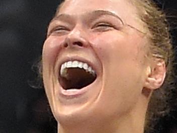 Ronda Rousey, celebrates after defeating Cat Zingano in a UFC 184 mixed martial arts bantamweight title bout, Saturday, Feb. 28, 2015, in Los Angeles. Rousey won after Zingano tapped out 14 seconds into the first round. (AP Photo/Mark J. Terrill)