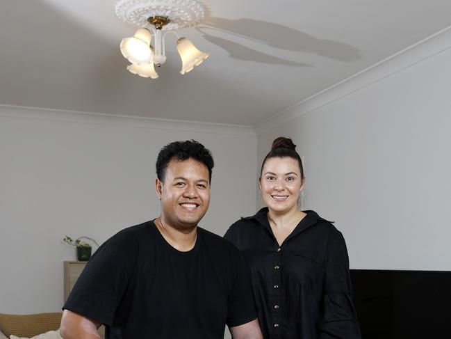 Alana Kotzas and Mark Faletui pictured inside their first home in Tenerife, Brisbane 14th February 2024.  (Image/Josh Woning)