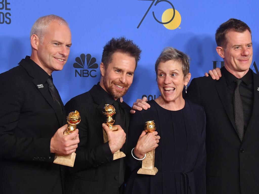 Martin McDonagh, Sam Rockwell, Frances McDormand and Graham Broadbent pose with the award for Best Motion Picture Drama for ‘Three Billboards Outside Ebbing, Missouri’ during the 75th Golden Globe Awards. Picture: AFP