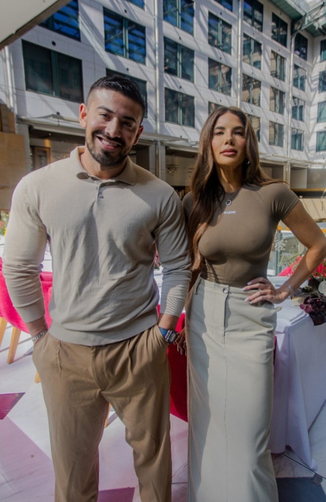 Jono and Amy at the launch of their new gym at The Fullerton Hotel.