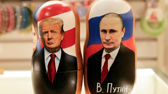 Matryoshka dolls depicting Vladimir Putin and President Donald Trump at a gift shop in Moscow. Picture: AFP.