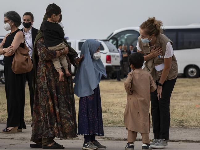 Afghan families arrive in Spain. Picture: Getty Images