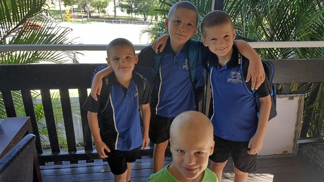 Brothers Khynan, Dylan, Arlen Reid (back) and Brandon Pickering (front centre) in One Mile State School uniform. Picture: Contributed