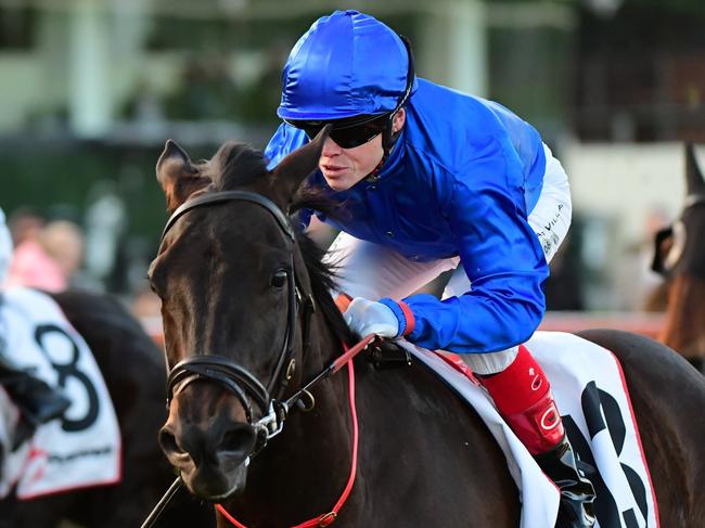 MELBOURNE, AUSTRALIA - JULY 30:  Craig Williams riding Lackeen winning Race 8, the Ranvet Travis Harrison Cup,  during Melbourne Racing at Moonee Valley Racecourse on July 30, 2022 in Melbourne, Australia. (Photo by Vince Caligiuri/Getty Images)