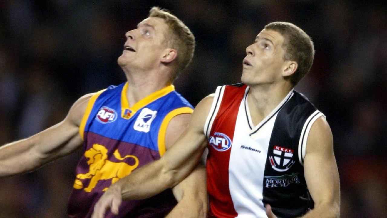 Brothers Michael Voss (left) and Brett Voss compete in a marking contest during a clash between St Kilda and Brisbane in June 2003. Picture: Colleen Petch