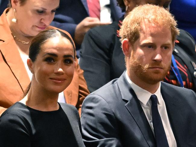 (FILES) Prince Harry (R) and Meghan Markle (L), the Duke and Duchess of Sussex, attend the 2020 UN Nelson Mandela Prize award ceremony at the United Nations in New York on July 18, 2022. A multi-million-dollar deal between a media group run by Britain's Prince Harry and his wife Meghan Markle, and streaming giant Spotify is to end, a report said June 15, 2023. (Photo by TIMOTHY A. CLARY / AFP)