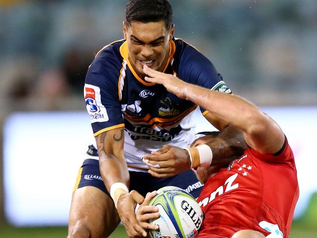 CANBERRA, AUSTRALIA - APRIL 28: Israel Dagg of the Crusaders is tackled high by Chance Peni of the Brumbies during the round 11 Super Rugby match between the Brumbies and the Crusaders at GIO Stadium on April 28, 2018 in Canberra, Australia.  (Photo by Mark Nolan/Getty Images)