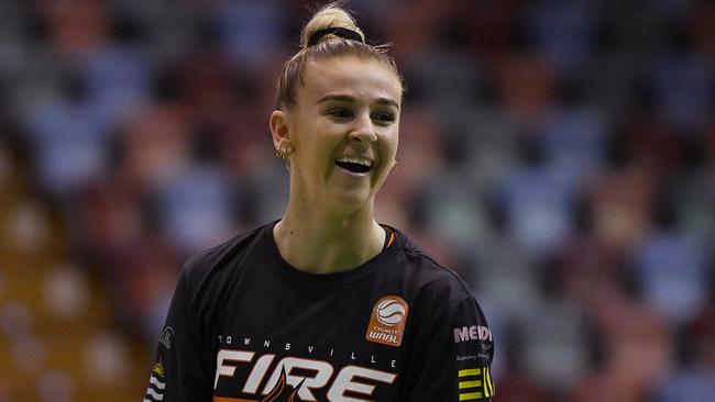 Steph Reid of the Fire warms up before the start of the WNBL match between Townsville Fire and Melbourne Boomers at Townsville Entertainment Centre, on December 23, 2023, in Townsville, Australia. (Photo by Ian Hitchcock/Getty Images)