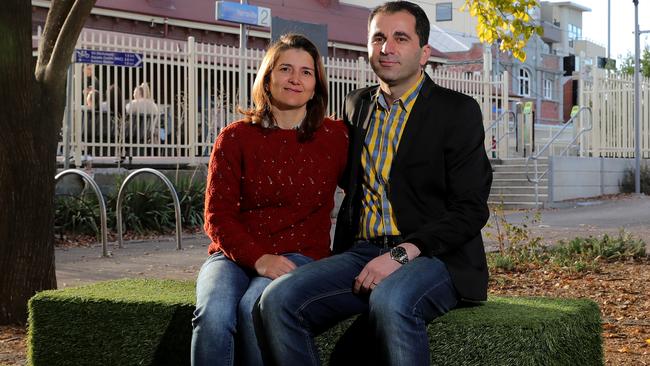 Asseel Yako, sitting with his wife Noor, saved hundreds of lives working during the conflict with ISIS. Picture: Stuart McEvoy.