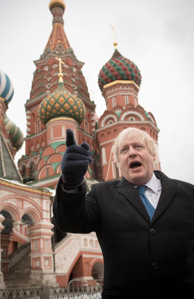 British Foreign Secretary Boris Johnson stands in front of Saint Basil's cathedral in Red Square. His trip was the first official visit by a foreign minister from London in five years. Picture: AFP / Stefan Rousseau