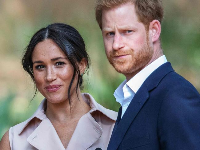 (FILES) In this file photo taken on October 02, 2019 Britain's Prince Harry, Duke of Sussex(R) and Meghan, the Duchess of Sussex(L) arrive at the British High Commissioner residency in Johannesburg. - A British newspaper group on Tuesday won a ruling to amend its defence against a high-profile claim by Meghan Markle for breach of privacy and copyright. The former television actress is suing Associated Newspapers over the publication of extracts of a letter she wrote to her estranged father before her wedding to Prince Harry in 2018. (Photo by Michele Spatari / AFP) / France OUT until 2019-10-17T00:00:00.000+02:00