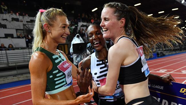 FLORENCE, ITALY - JUNE 02: Faith Kipyegon of Team Kenya interacts with Jessica Hull of Team Australia and Ciara Mageean of Team Ireland after victory in the Women's 1500m during the Golden Gala Pietro Mennea, part of the Diamond League series at Rodolfi Stadium on June 02, 2023 in Florence, Italy. (Photo by Valerio Pennicino/Getty Images)