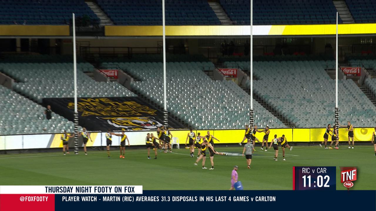 The Tigers had a banner over seats where the cheersquad would normally be.