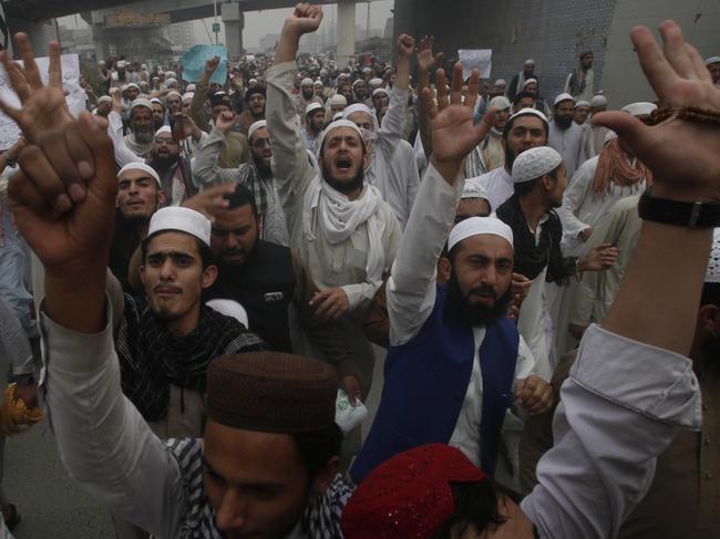 Pakistan protesters  rally to condemn a Supreme Court decision that ordered the release of Asia Bibi, a Catholic mother of five who has been on death row since 2010 accused of blasphemy, Wednesday, Oct. 31, 2018, in Peshawar, Pakistan. Pakistan's top court on Wednesday acquitted Bibi who was sentenced to death under the country's controversial blasphemy law, a landmark ruling that sparked protests by hard-line Islamists and raised fears of violence. (AP Photo/Muhammad Sajjad)