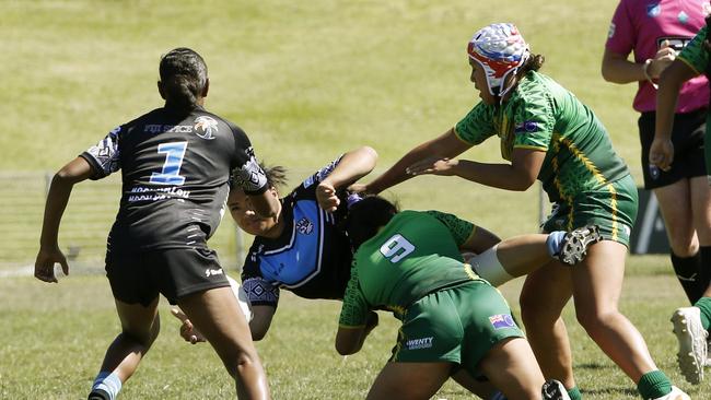 Action from Under 18 Girls Ozzy Cooks (cook islands) v Fiji. Harmony Nines Rugby League. Picture: John Appleyard