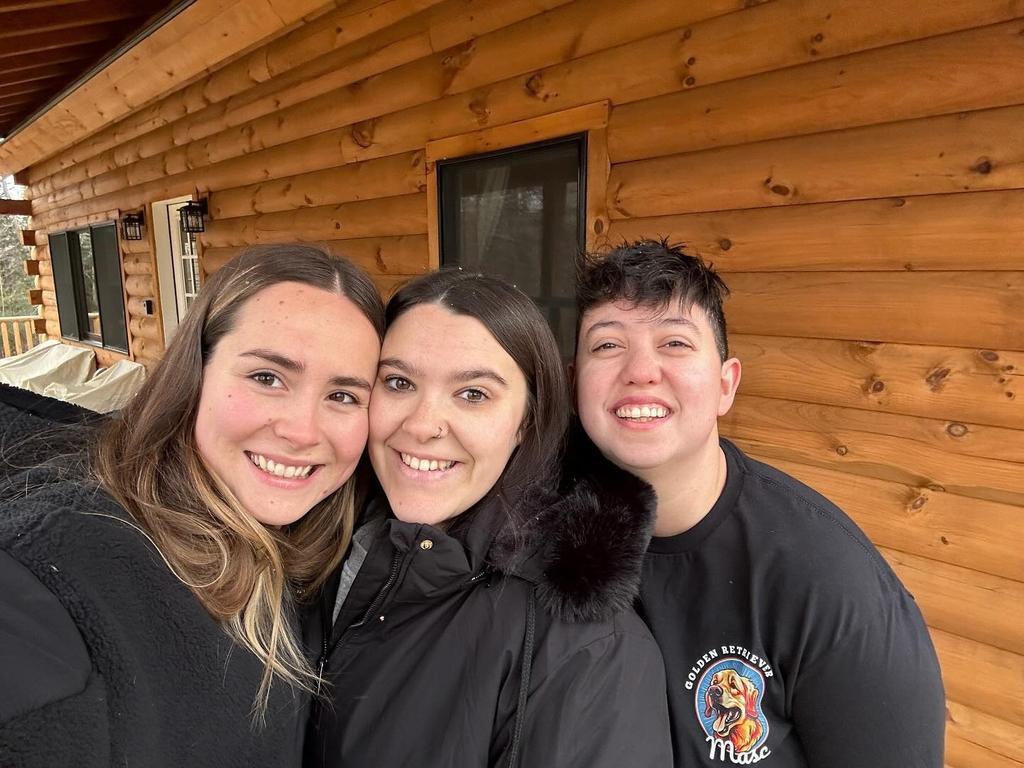 Kaylie, left, was the couple’s maid of honour – but the bridesmaid later joined the relationship. Picture: Instagram/traveling_throuple