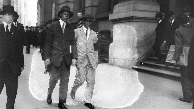 Author Upton Sinclair, in white suit with black arm band, picketing Rockefeller Building in 1914. Picture: US Library of Congress