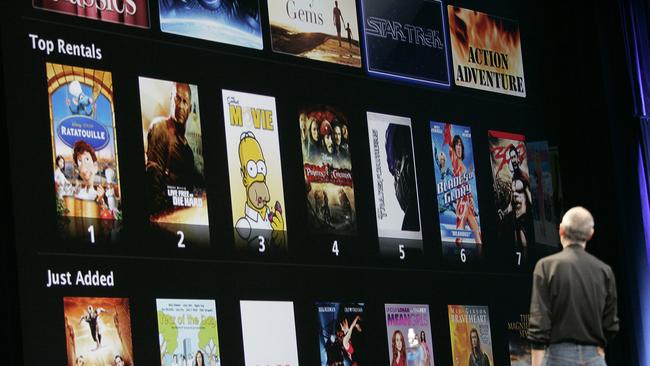 Then CEO Steve Jobs shows off the new iTunes movie rentals at the MacWorld Conference &amp; Expo in California. Apple’s services business is becoming an increasingly important part of investors’ earnings expectations. Picture: AFP