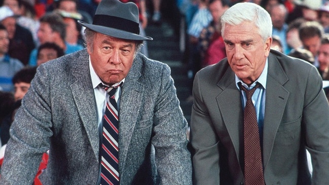 Leslie Nielsen (right) manages to keep a straight face in the Naked Gun. Pictured: Supplied.