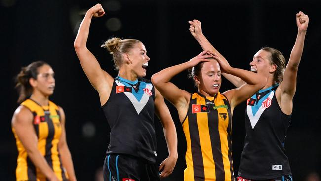 MELBOURNE, AUSTRALIA - NOVEMBER 16: Ashleigh Saint and Ella Boag of the Power celebrate winning the AFLW Semi Final match between Hawthorn Hawks and Port Adelaide at Ikon Park, on November 16, 2024, in Melbourne, Australia. (Photo by Quinn Rooney/Getty Images)