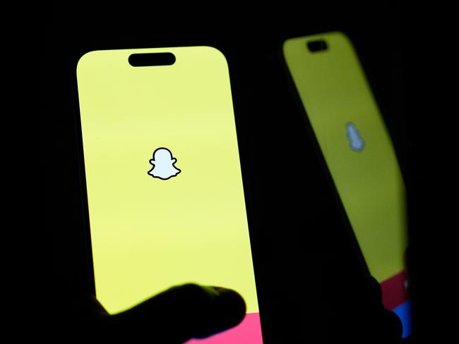 MELBOURNE, AUSTRALIA - NOVEMBER 30: In this photo illustration, the Snapchat app is open displayed on a phone on November 30, 2024 in Melbourne, Australia. Australia has recently enacted a groundbreaking law prohibiting individuals under the age of 16 from accessing social media platforms, marking one of the strictest regulations of its kind globally. This legislation, which holds social media companies accountable for enforcing the ban with potential fines of up to AUD 50 million, aims to protect young users from online dangers such as bullying and exploitation, reflecting a significant shift in how governments address youth safety in the digital age. (Photo Illustration by Asanka Ratnayake/Getty Images)