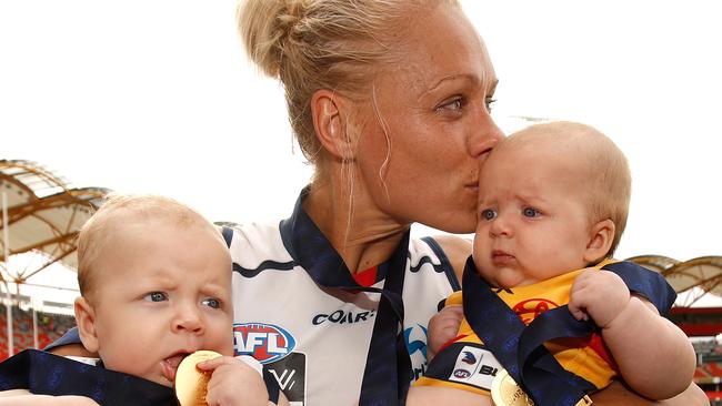 Erin Phillips of the Crows celebrates with children Blake and Brooklyn.