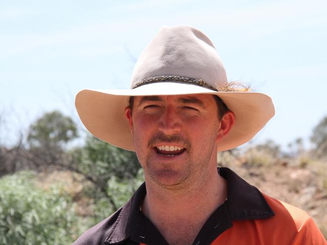 Minister for Planning, Lands, and Environment Josh Burgoyne outside of Alice Springs announcing the âdob in a dumperâ campaign on Friday, November 22, 2024. Picture: Gera Kazakov