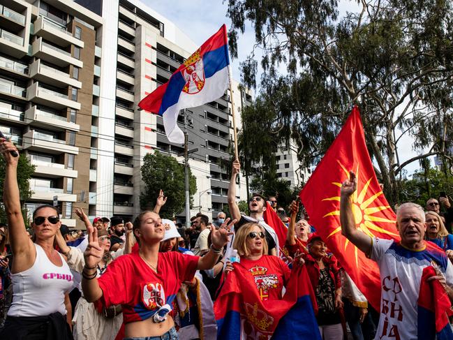 Supporters rally outside the Park Hotel where Djokovic was being held in detention. Picture: Getty Images.