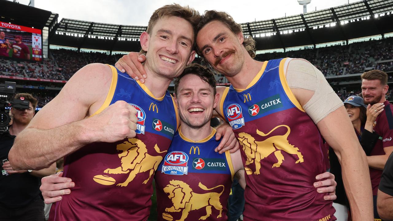 MELBOURNE , AUSTRALIA. September 28, 2024. AFL Grand Final between the Brisbane Lions and Sydney Swans at the MCG. Winning Brisbane Lions players Harris Andrews, Lachie Neale and Joe Daniher. Picture: David Caird