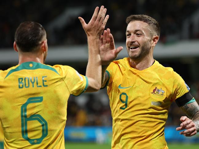 Goalscorers Adam Taggart (right) and Martin Boyle celebrate during Australia’s win in Perth. Picture: Paul Kane/Getty Images