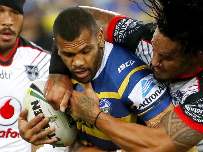 Manu Ma'u of the Eels is tackled by Tevita Satae of the Warriors (right) during the Round 11 NRL match between the Parramatta Eels and the Warriors at ANZ Stadium in Sydney, Friday, May 18, 2018. (AAP Image/Daniel Munoz) NO ARCHIVING, EDITORIAL USE ONLY